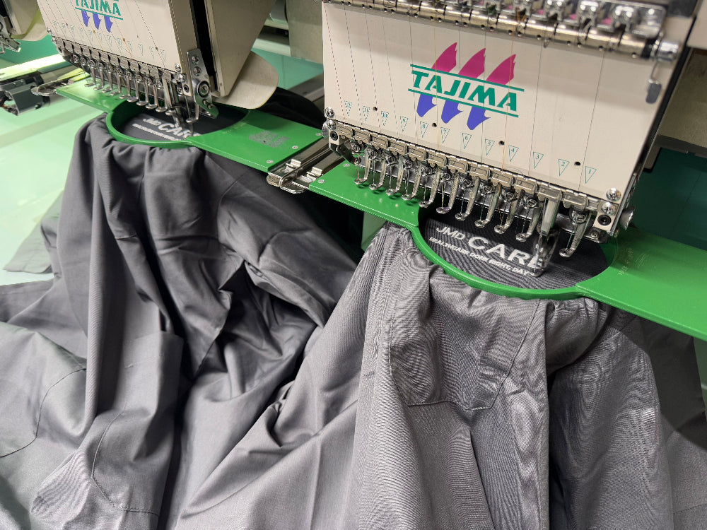 Scrub top on embroidery machine